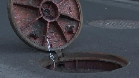 An open manhole in Belgium