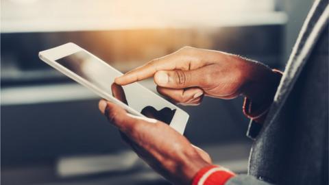 man using a screen