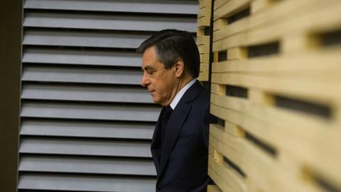 French "Les Republicains" party candidate for 2017 presidential election Francois Fillon arrives to take part in a meeting