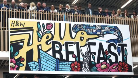A mural at Ulster University that reads: Hello Belfast