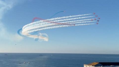 Red arrows over Carbis Bay