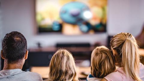 Family watching TV