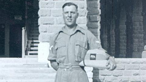 A black and white photo of Lance Corporal Kirby in his uniform