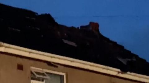 Damaged roof of house