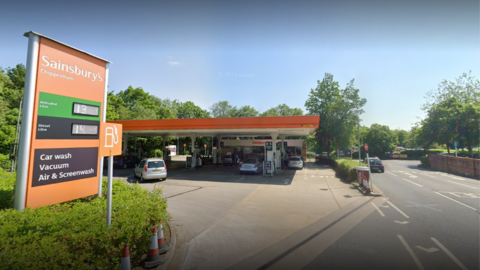 Sainsburys garage in Chippenham with some cars on the forecourt