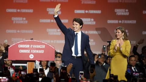 After winning a narrow election, Canada's prime minister celebrates with supporters in Montreal.