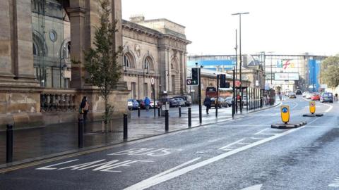 The bus lane on Neville Street, next to Newcastle's Central Station