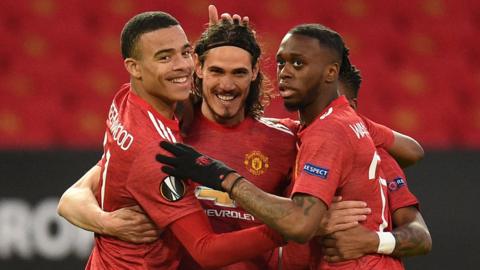 Edinson Cavani celebrates with Mason Greenwood and Aaron Wan-Bissaka