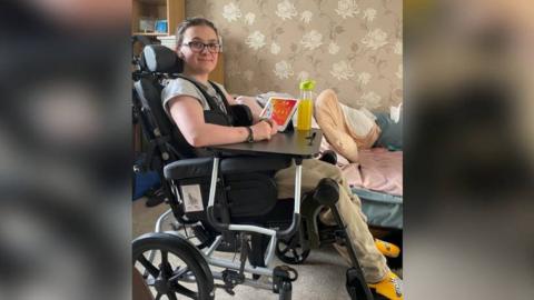 Hollie Smith at home after her illness