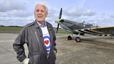 Sqn Ldr Allan Scott with a Spitfire