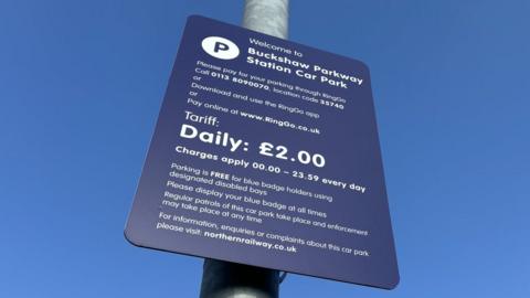 car park pricing sign