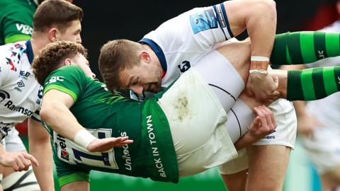 Bristol centre Sam Bedlow tip-tackles London Irish centre Theo Brophy Clews