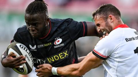 Saracens wing Rotimi Segun holds off Ulster's Aaron Sexton