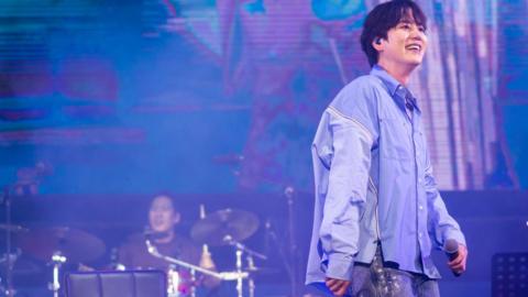 Kyuhyun, a member of K-pop boy group Super Junior performs at Seoul Park Music Festival