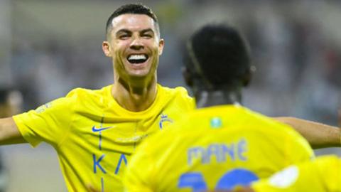 Cristiano Ronaldo celebrates a goal with Sadio Mane