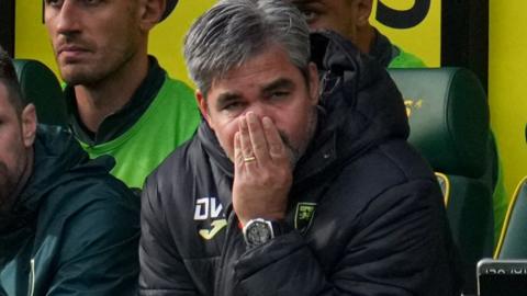 David Wagner covers his face after Norwich concede for a third time