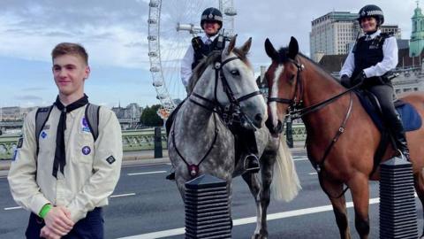 Nathan in London with police horses