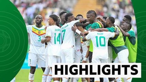 Senegal players celebrate their win over The Gambia