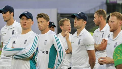 England's players after the defeat by Bangladesh