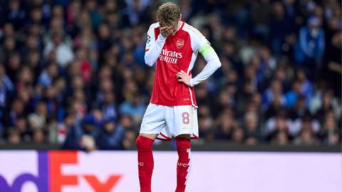 Martin Odegaard puts his hand to his head after the final whistle