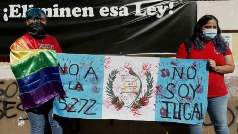 Students and members of LGBTIQ groups demonstrate in front of the congress in Guatemala City, Guatemala, 15 March 2022.