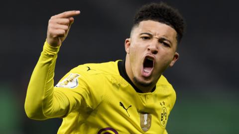 Jadon Sancho celebrates scoring for Borussia Dortmund