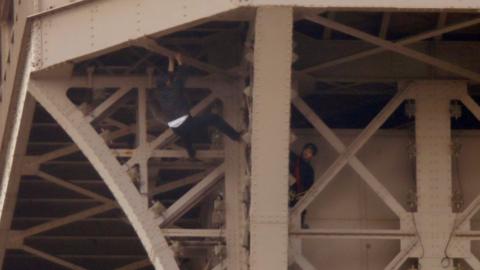 Rescue workers attempted to reach the man, whose motivation was unclear