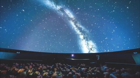 Visitors enjoy the planetarium at We The Curious