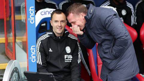 Chirs Davies chatting with Brendan Rodgers while at Leicester City