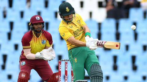 West Indies wicketkeeper Nicholas Pooran and South Africa's Reeza Hendricks