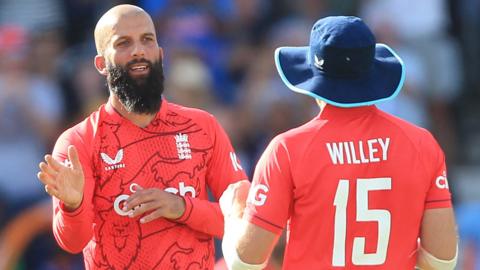 Moeen Ali (left) and David Willey (right) celebrate