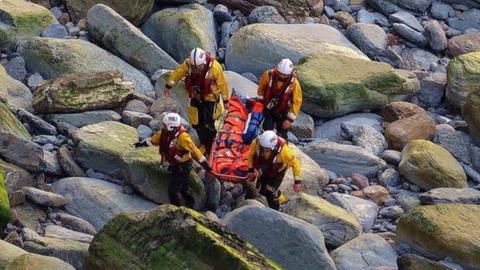 Emergency service workers with stretcher