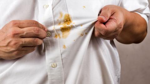 Stock image of a shirt with a food stain