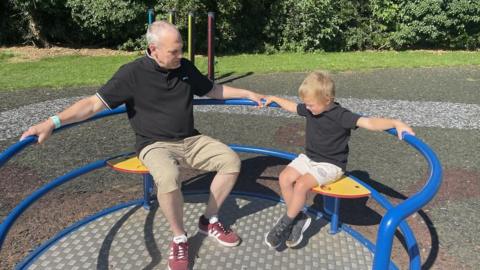 Jason and Anakin on a playground