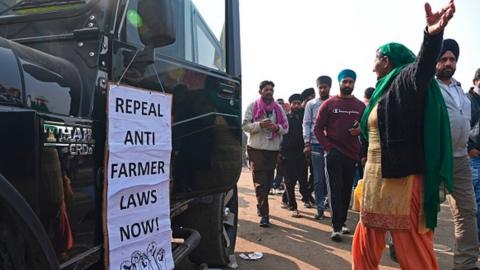 A woman farmer protesting on Delhi border on 8 Dec