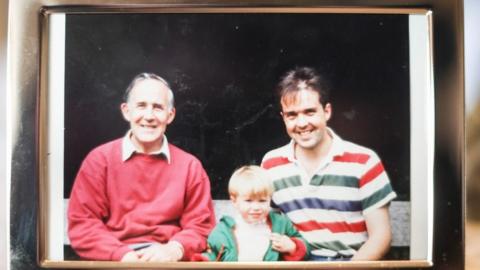 Dr Blair Smith with his father and son Louis