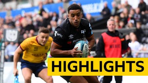 Keelan Giles of Ospreys scores a try against Glasgow Warriors