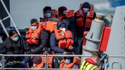 Migrants after crossing English Channel