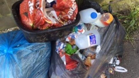 Burst rubbish sacks in Bridgend