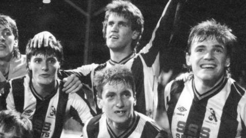 Chorley's players celebrate beating Wolves in the FA Cup in 1986