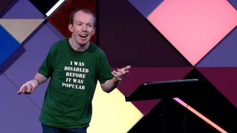 "Lost Voice Guy" (a.k.a. Lee Ridley) on stage