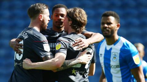 Brentford's Mads Sorensen celebrates scoring with Pontus Jansson and Ethan Pinnock