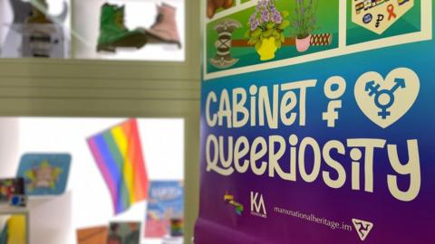 Cabinet of Queeriosity sign