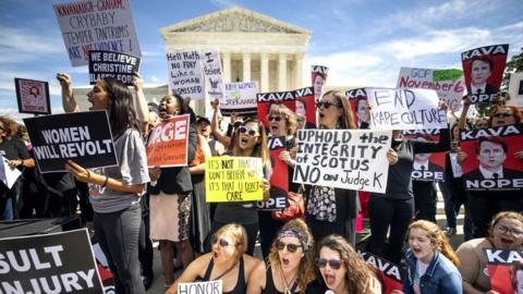 Protesters opposed to Supreme Court nominee Brett Kavanaugh gather outside the Supreme Court