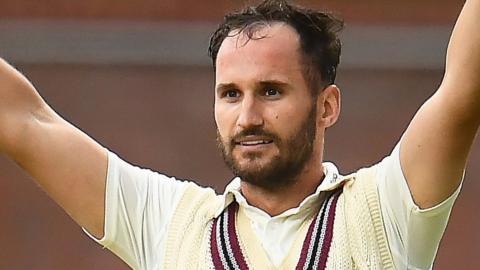 Lewis Gregory celebrates reaching his century against Hampshire