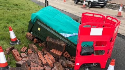 The telephone exchange box damaged by a car crash in Capel Hendre