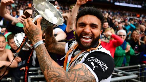 Tobi Adebayo-Rowling celebrates Notts County's promotion