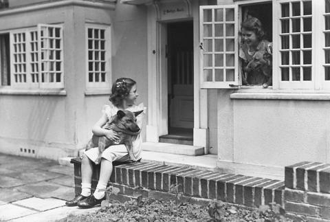 Princess Elizabeth with her giant toy house