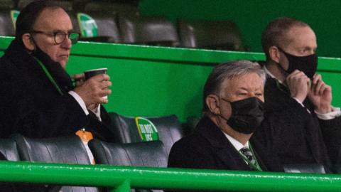 Celtic chief executive Peter Lawwell, front