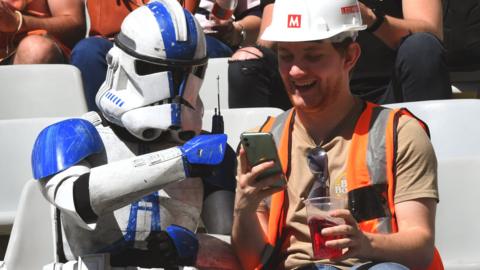 Fans enjoy the Rugby Sevens World Cup in Cape Town